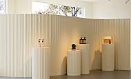 Decorative objects displayed in a sunlit design showroom